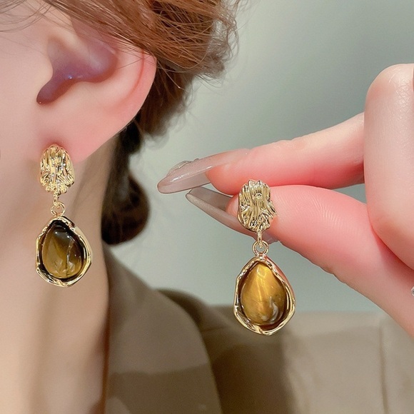 Anthropologie Jewelry - Anthropologie Gold and Brown Drop Earrings